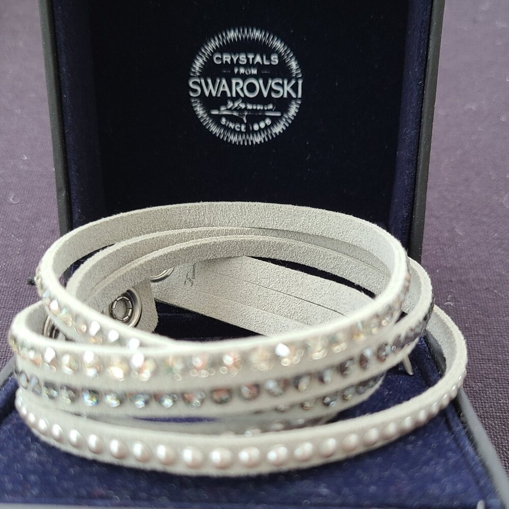 Swarovski Suede Wrap barcelet.  Light grey and/or brown.